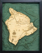 The Big Island, Hawaii 3D layered wood map in laser-cut Baltic birch, shown framed against a light wall