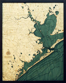 Houston, Texas 3D layered wood map in laser-cut Baltic birch, shown framed against a light wall