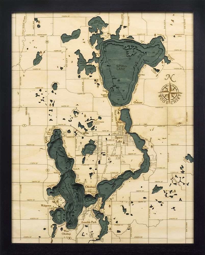 Lake Okoboji, Iowa 3D layered wood map in laser-cut Baltic birch, shown framed against a light wall
