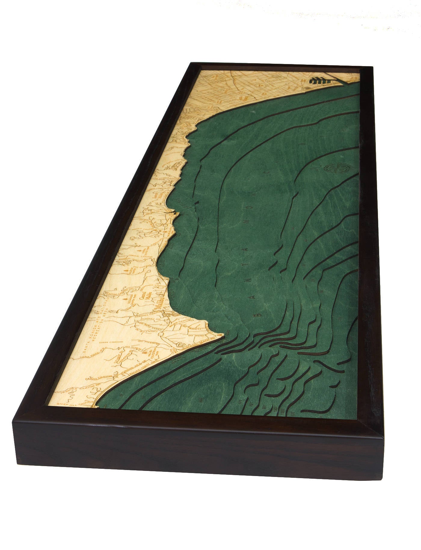 Malibu, California 3D layered wood map in laser-cut Baltic birch, shown framed against a light wall