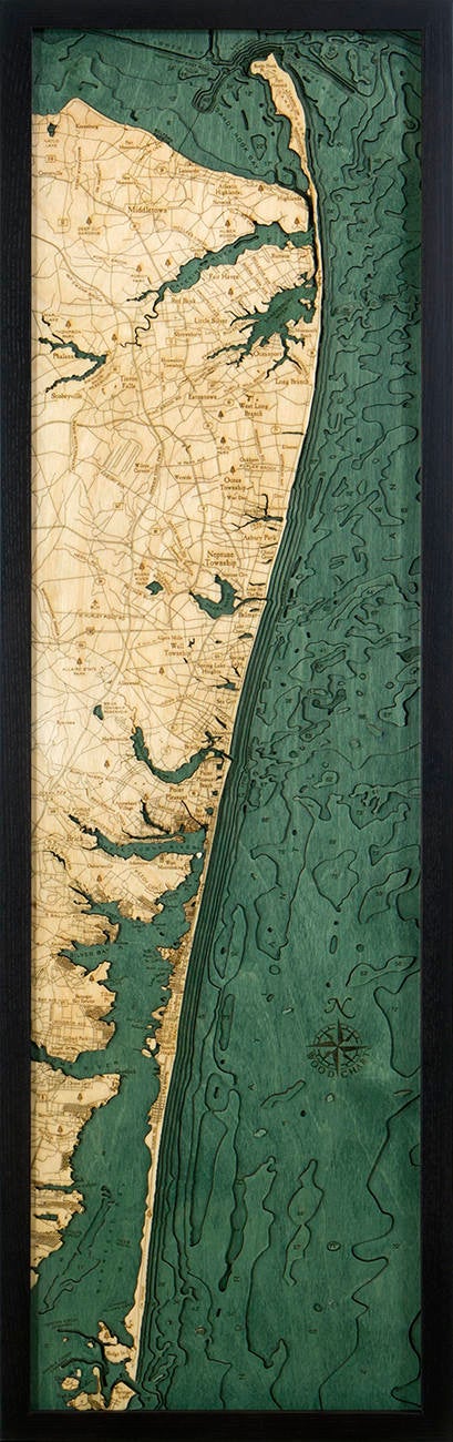 New Jersey North Shore 3D layered wood map in laser-cut Baltic birch, shown framed against a light wall