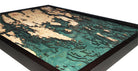 Boothbay Harbor, Maine 3D layered wood map in laser-cut Baltic birch, shown framed against a light wall