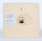 Great Lakes wood cribbage board in laser-cut Baltic birch, shown framed against a light wall