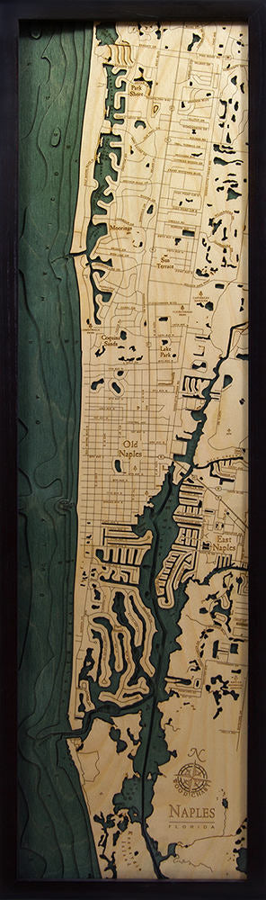 Naples, Florida 3D layered wood map in laser-cut Baltic birch, shown framed against a light wall