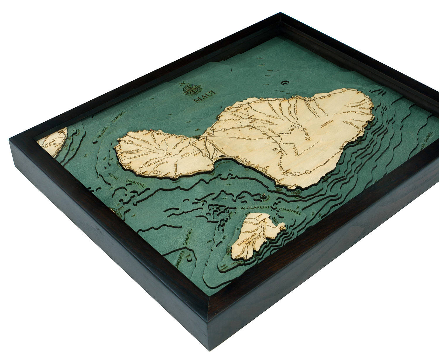 Maui, Hawaii 3D layered wood map in laser-cut Baltic birch, shown framed against a light wall