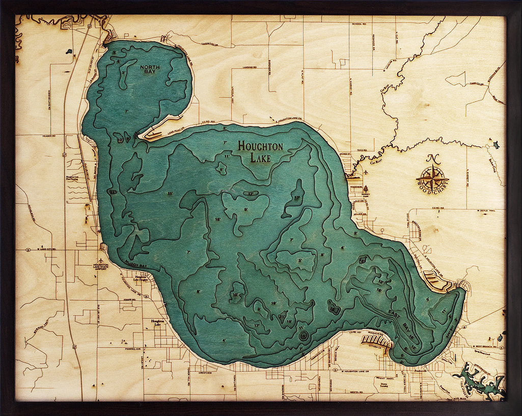 Houghton Lake, Michigan 3D layered wood map in laser-cut Baltic birch, shown framed against a light wall