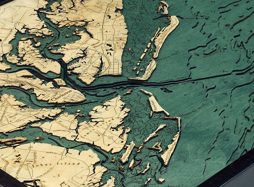 Charleston, South Carolina 3D layered wood map in laser-cut Baltic birch, shown framed against a light wall