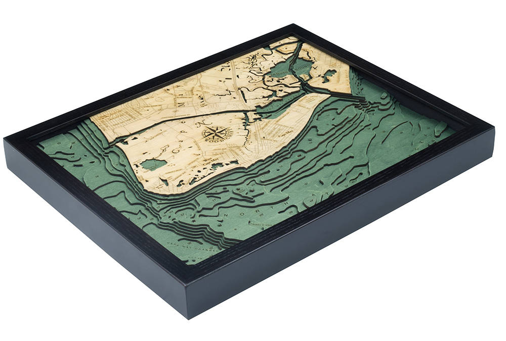 Cape May, New Jersey 3D layered wood map in laser-cut Baltic birch, shown framed against a light wall