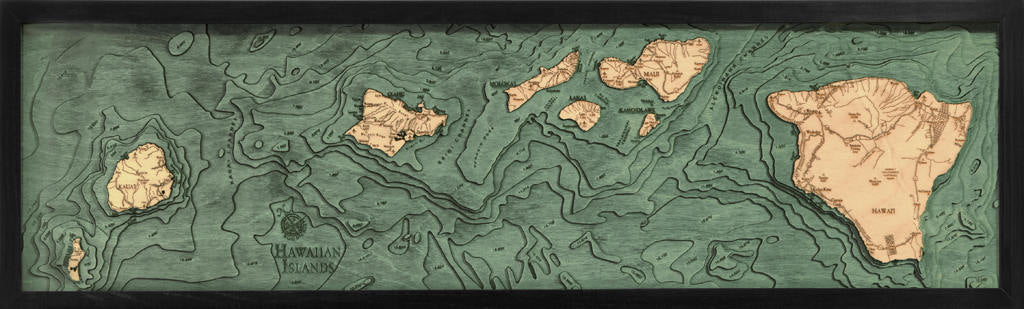 Hawaiian Islands 3D layered wood map in laser-cut Baltic birch, shown framed against a light wall