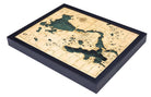 Lake Okoboji, Iowa 3D layered wood map in laser-cut Baltic birch, shown framed against a light wall