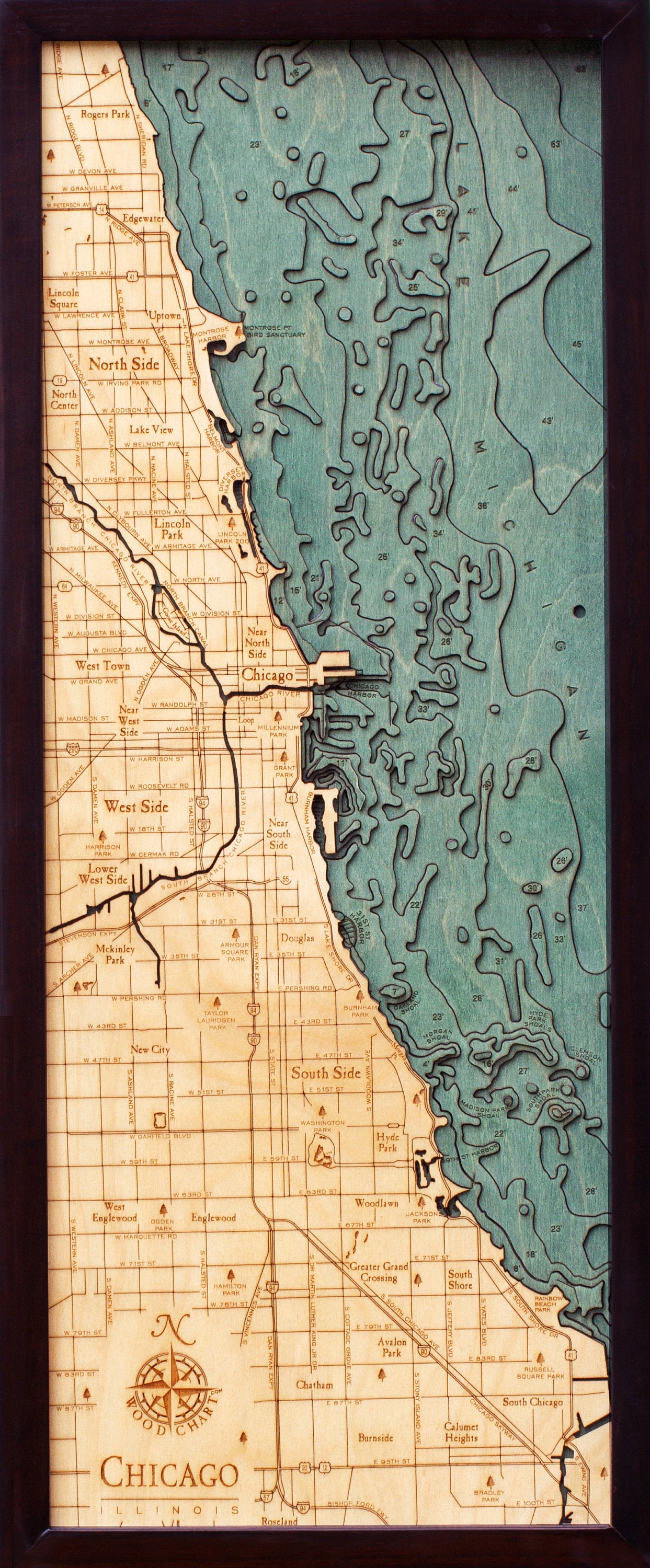 Chicago, Illinois 3D layered wood map in laser-cut Baltic birch, shown framed against a light wall
