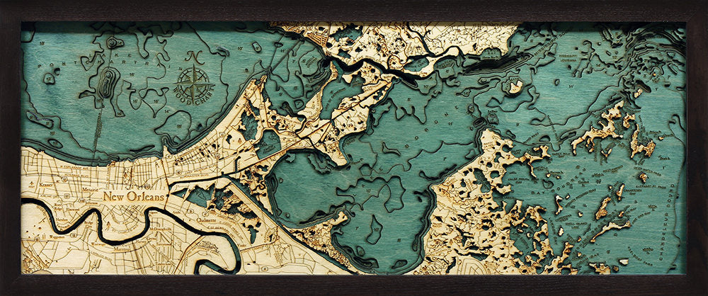 New Orleans, Louisiana 3D layered wood map in laser-cut Baltic birch, shown framed against a light wall