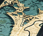 New Orleans, Louisiana 3D layered wood map in laser-cut Baltic birch, shown framed against a light wall