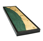 Muskegon to South Haven, Michigan 3D layered wood map in laser-cut Baltic birch, shown framed against a light wall