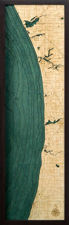 Muskegon to South Haven, Michigan 3D layered wood map in laser-cut Baltic birch, shown framed against a light wall