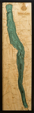 Seneca Lake, New York 3D layered wood map in laser-cut Baltic birch, shown framed against a light wall