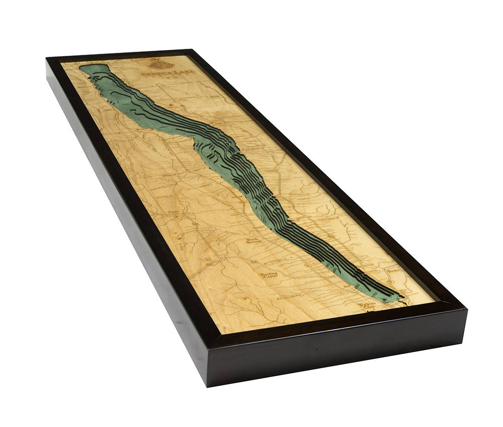 Seneca Lake, New York 3D layered wood map in laser-cut Baltic birch, shown framed against a light wall