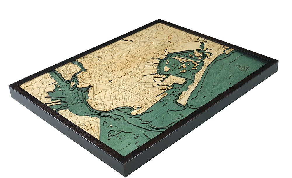 Brooklyn, New York 3D layered wood map in laser-cut Baltic birch, shown framed against a light wall