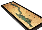 Lake George, New York 3D layered wood map in laser-cut Baltic birch, shown framed against a light wall