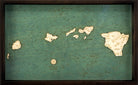 Hawaiian Islands wood serving tray in laser-cut Baltic birch, shown framed against a light wall