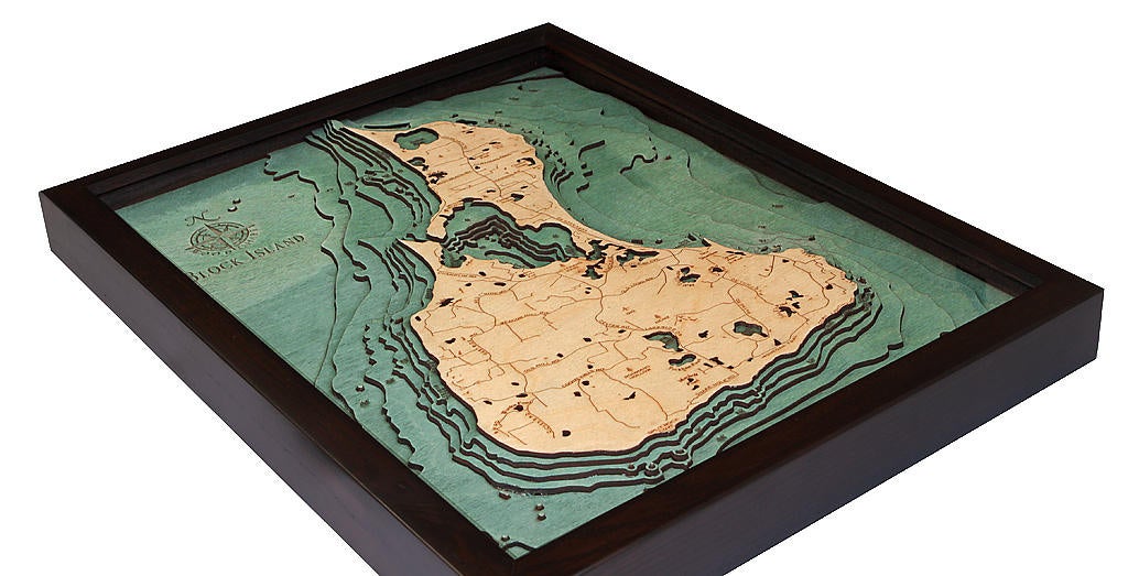 Block Island, Rhode Island 3D layered wood map in laser-cut Baltic birch, shown framed against a light wall