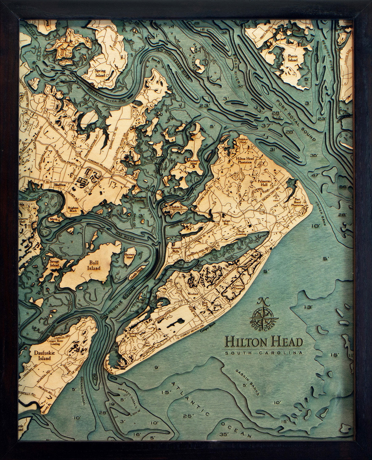 Hilton Head, South Carolina 3D layered wood map in laser-cut Baltic birch, shown framed against a light wall