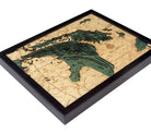 Lake Huron, Michigan 3D layered wood map in laser-cut Baltic birch, shown framed against a light wall