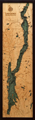 Lake George, New York 3D layered wood map in laser-cut Baltic birch, shown framed against a light wall