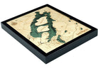 Lake Placid, New York 3D layered wood map in laser-cut Baltic birch, shown framed against a light wall