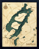 Lake Placid, New York 3D layered wood map in laser-cut Baltic birch, shown framed against a light wall