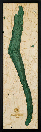 Lake Skaneateles, New York 3D layered wood map in laser-cut Baltic birch, shown framed against a light wall