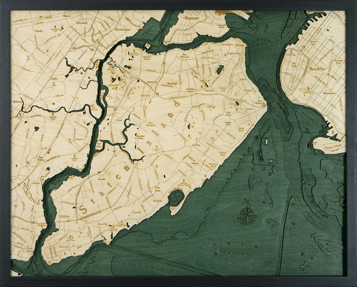 Staten Island, New York 3D layered wood map in laser-cut Baltic birch, shown framed against a light wall