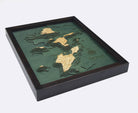 Put-in-Bay, Ohio 3D layered wood map in laser-cut Baltic birch, shown framed against a light wall