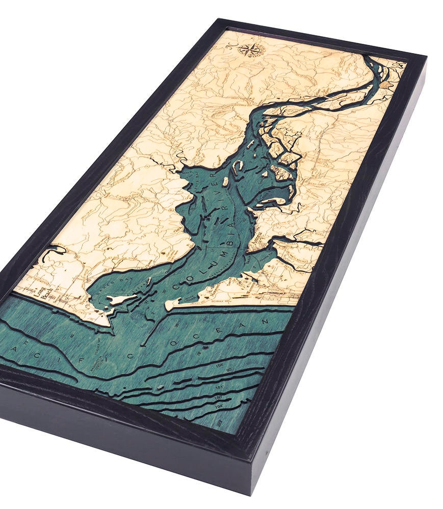 Columbia River Mouth, Oregon 3D layered wood map in laser-cut Baltic birch, shown framed against a light wall