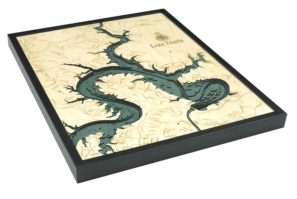 Lake Travis, Texas 3D layered wood map in laser-cut Baltic birch, shown framed against a light wall
