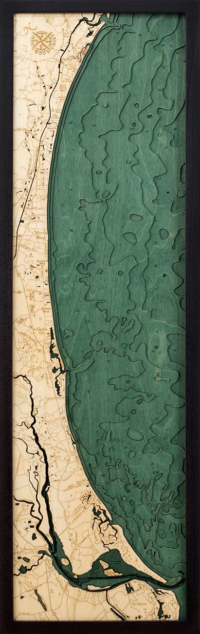 Myrtle Beach, South Carolina 3D layered wood map in laser-cut Baltic birch, shown framed against a light wall