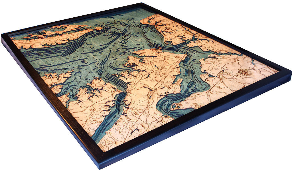 Norfolk, Virginia 3D layered wood map in laser-cut Baltic birch, shown framed against a light wall
