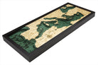 Mediterranean Sea 3D layered wood map in laser-cut Baltic birch, shown framed against a light wall
