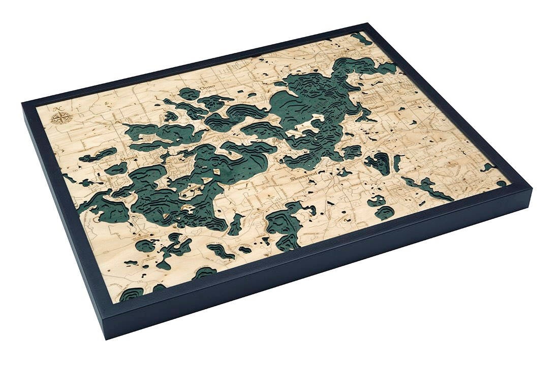 Lake Minnetonka, Minnesota 3D layered wood map in laser-cut Baltic birch, shown framed against a light wall