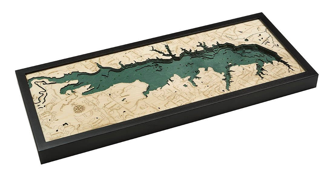 Grapevine Lake, Texas 3D layered wood map in laser-cut Baltic birch, shown framed against a light wall