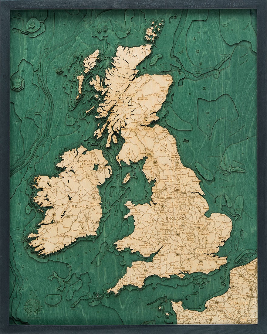 United Kingdom 3D layered wood map in laser-cut Baltic birch, shown framed against a light wall