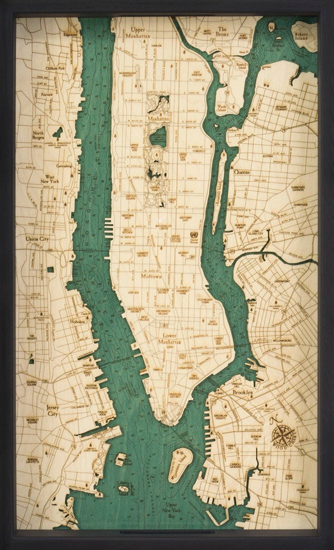 Manhattan, New York wood serving tray in laser-cut Baltic birch, shown framed against a light wall