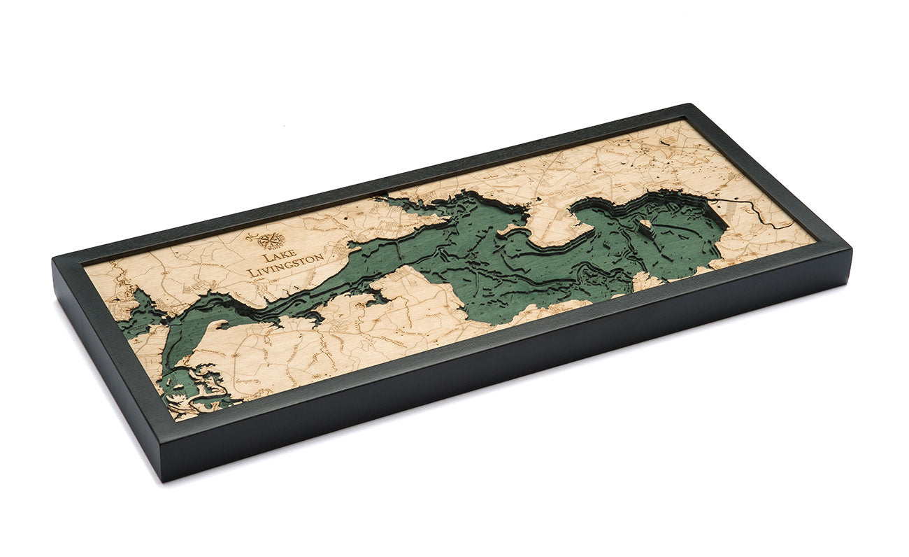 Lake Livingston, Texas 3D layered wood map in laser-cut Baltic birch, shown framed against a light wall