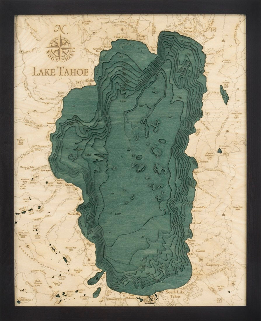 Lake Tahoe, California 3D layered wood map in laser-cut Baltic birch, shown framed against a light wall