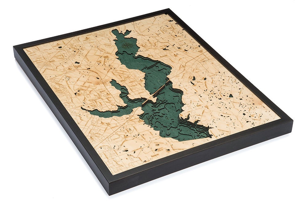 Lake Ray Hubbard, Texas 3D layered wood map in laser-cut Baltic birch, shown framed against a light wall