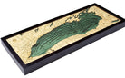 Lake Ontario 3D layered wood map in laser-cut Baltic birch, shown framed against a light wall