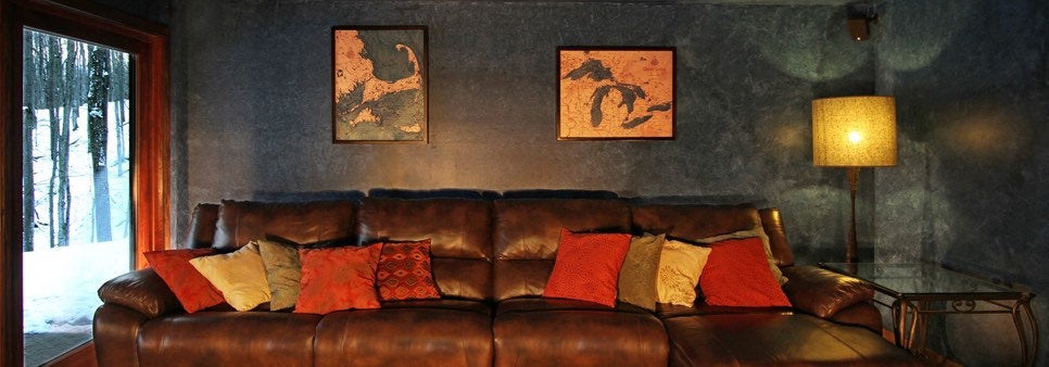 Lake Ontario 3D layered wood map in laser-cut Baltic birch, shown framed against a light wall