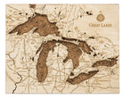 Great Lakes framed cork map in laser-cut Baltic birch, shown framed against a light wall