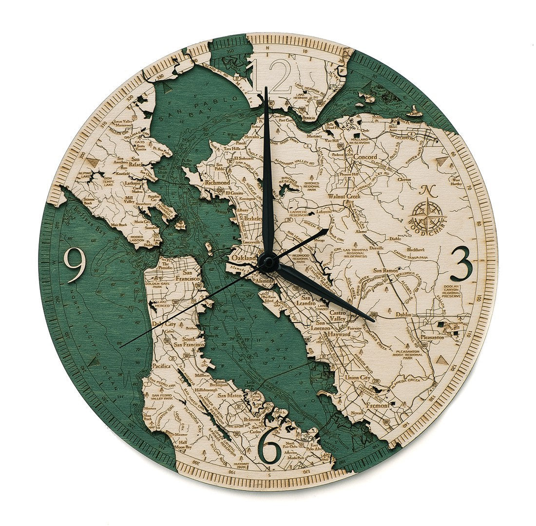San Francisco, California wood wall clock in laser-cut Baltic birch, shown framed against a light wall
