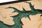 Lake Georgetown, Texas 3D layered wood map in laser-cut Baltic birch, shown framed against a light wall